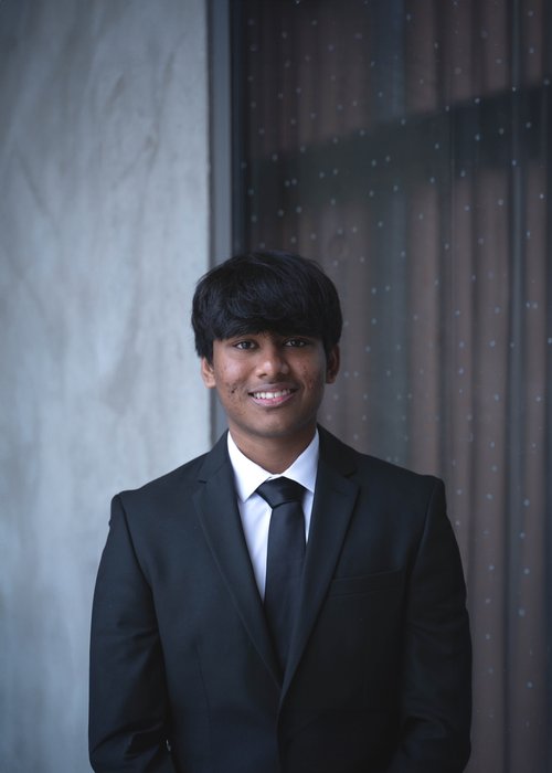 Professional headshot of Suhrit
